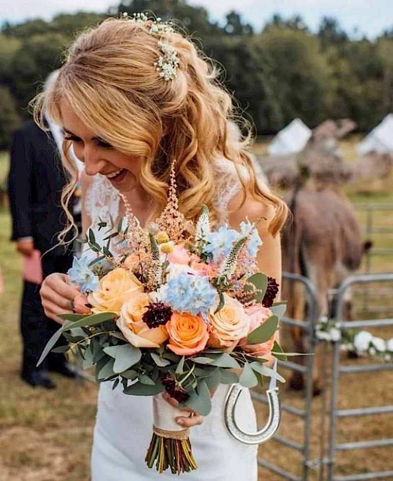 Boho hairstyle for bride getting married at Blackthorpe Barn, Bury St Edmunds Bridal Hair and Makeup Artist at Elegant Hair and Beauty